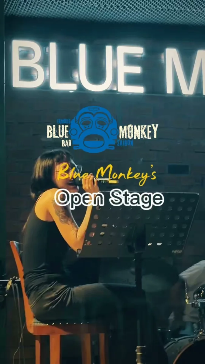 Blue Monkey Open Stage singer at the microphone.
