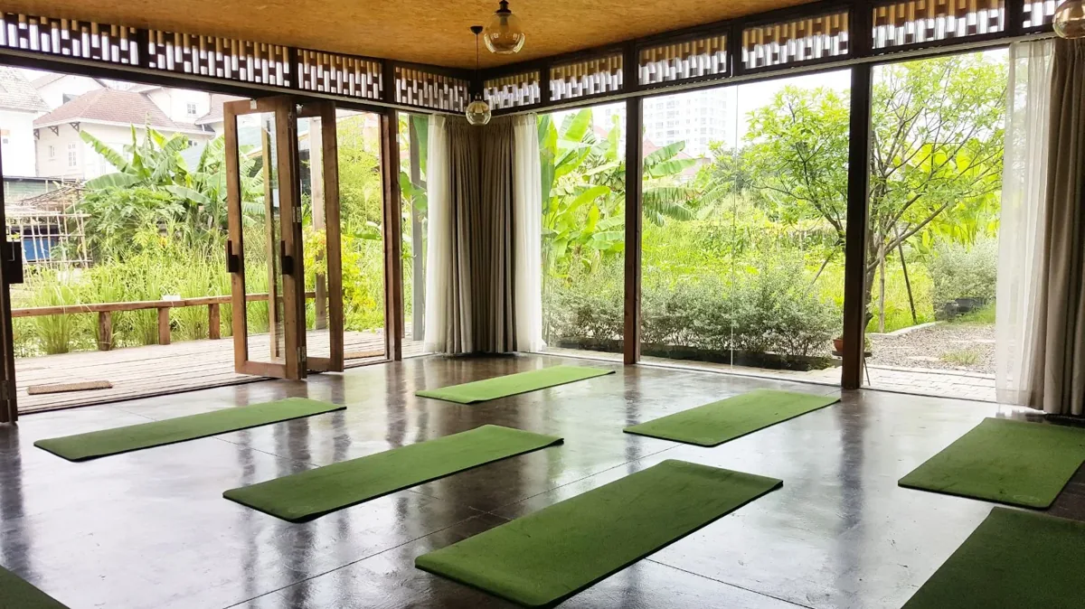 Yoga mats in the garden-facing Yoga Pod studio at 28 Thao Dien.