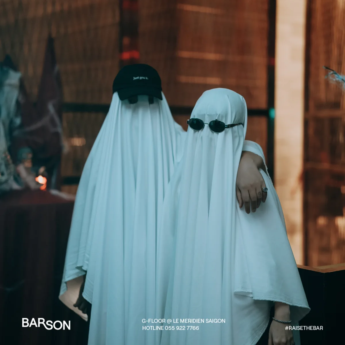 Two guests in ghost costumes in BAR SON’s Halloween promotion at Le Méridien Saigon.