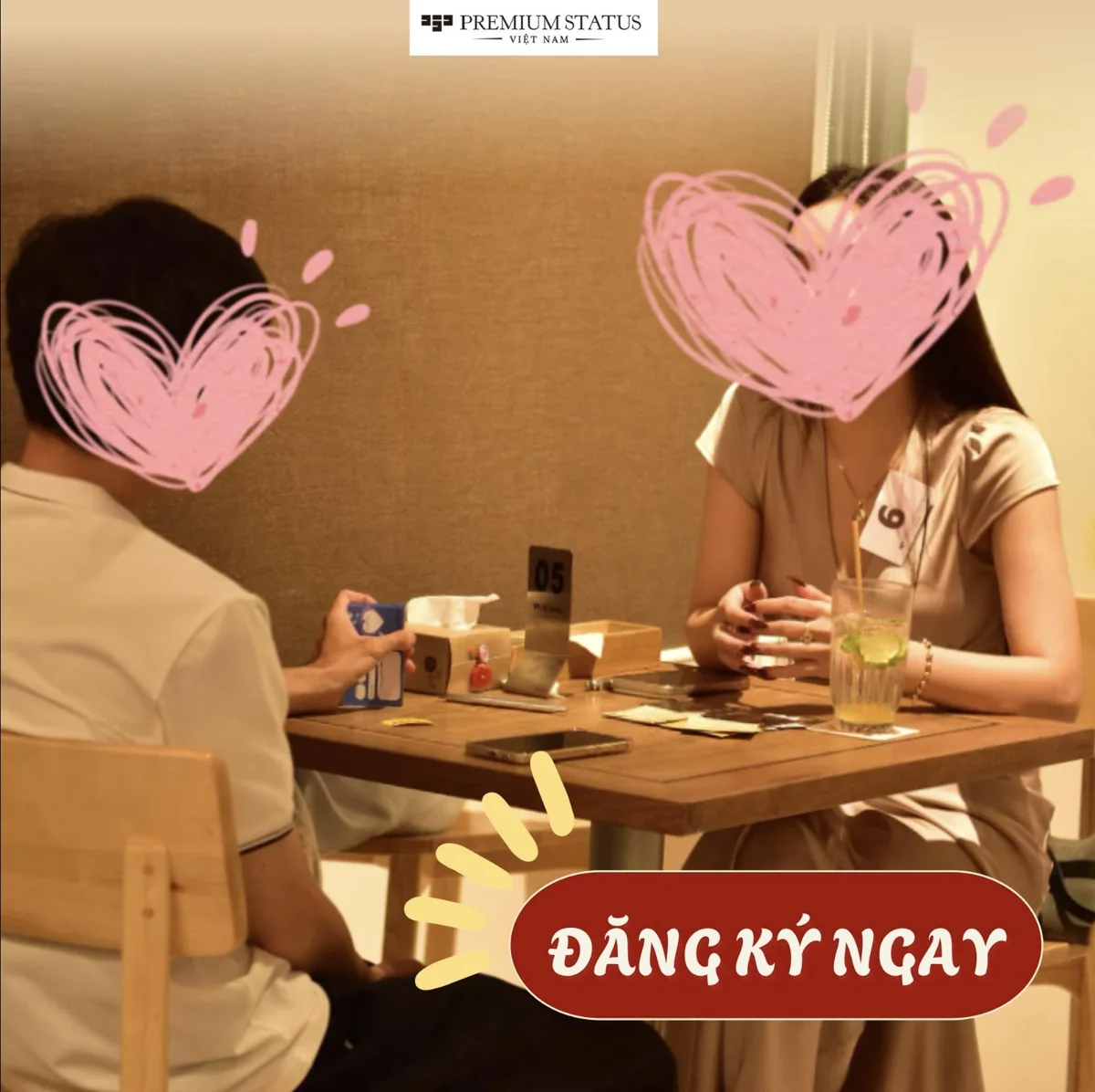 Premium Status Vietnam promotional photo of a seated singles conversation; it does not show the dated Sharaku party.