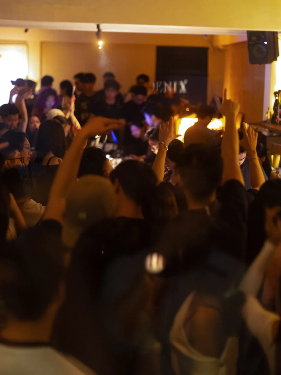 Crowd at the Before Hours bar; illustrative photo from the schedule post.